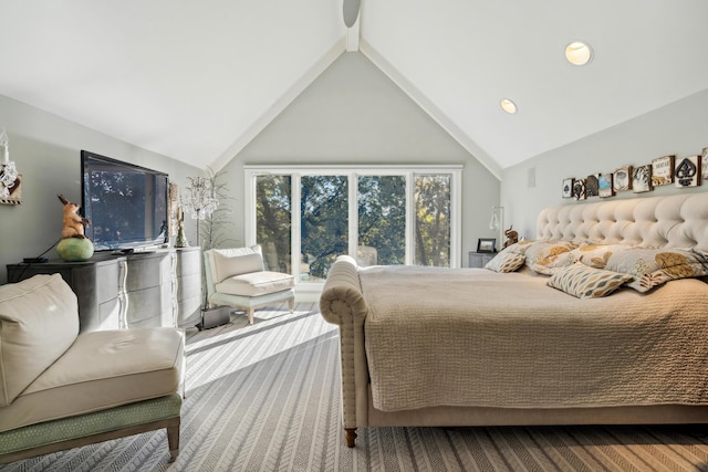 bedroom with lofted ceiling