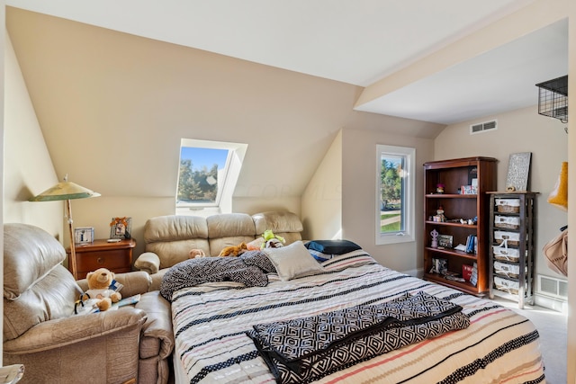 bedroom with lofted ceiling