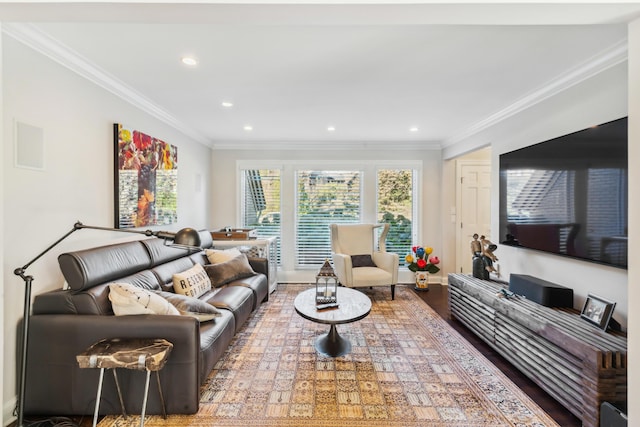 living room with ornamental molding and wood-type flooring