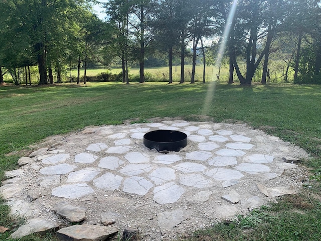 view of patio / terrace featuring a fire pit