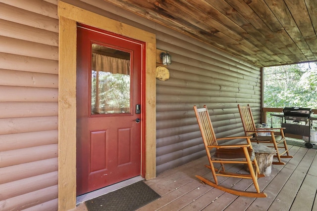 entrance to property with covered porch