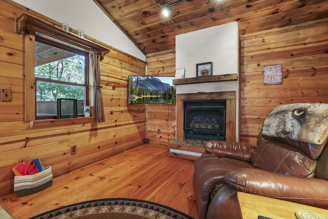 living room featuring wooden ceiling, wooden walls, wood-type flooring, and vaulted ceiling