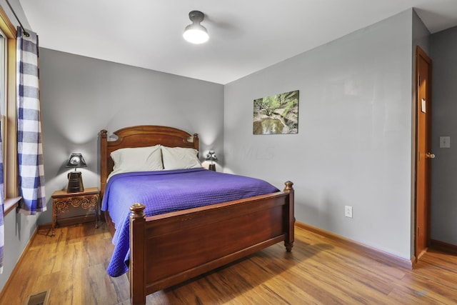 bedroom featuring light hardwood / wood-style floors