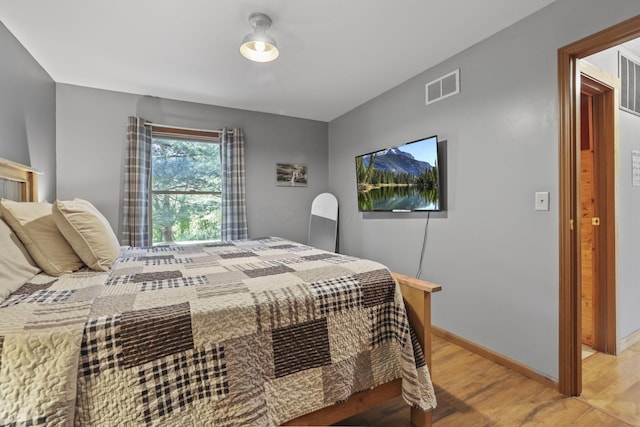 bedroom featuring light hardwood / wood-style floors