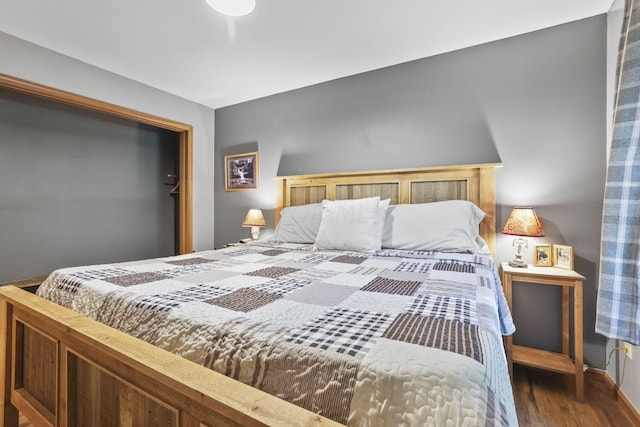 bedroom featuring dark hardwood / wood-style floors