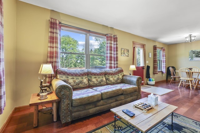 living room featuring dark wood-type flooring