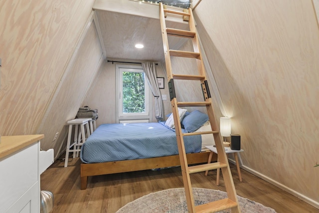 bedroom featuring dark hardwood / wood-style flooring