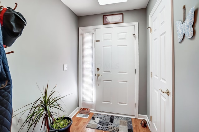 foyer entrance featuring hardwood / wood-style flooring