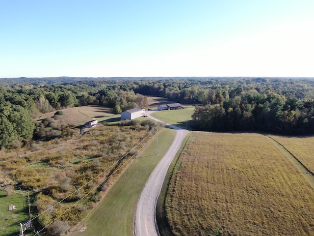 birds eye view of property featuring a rural view