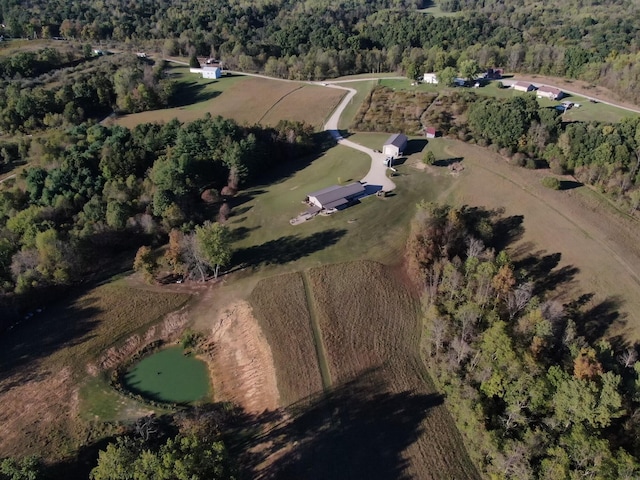 birds eye view of property featuring a rural view