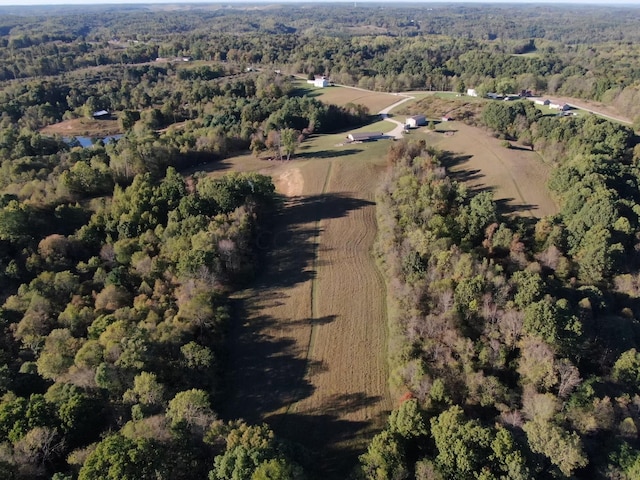 birds eye view of property featuring a rural view