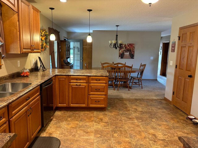 kitchen with kitchen peninsula, dishwasher, hanging light fixtures, and an inviting chandelier