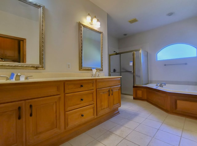 bathroom with tile patterned floors, vanity, and plus walk in shower