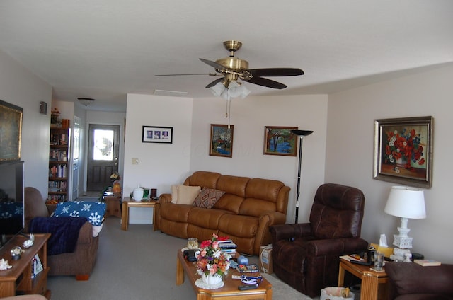 living room with carpet and ceiling fan