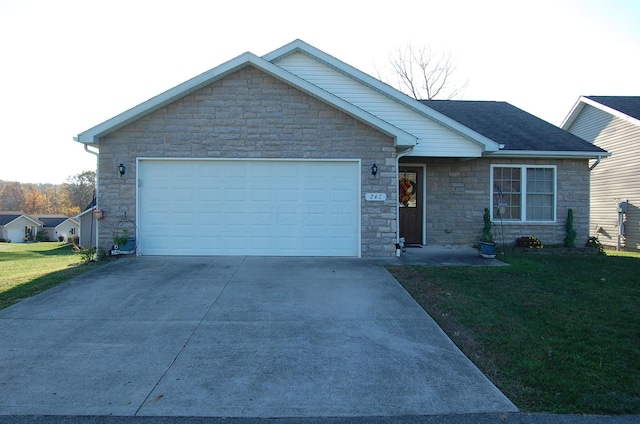 view of front facade featuring a front lawn and a garage