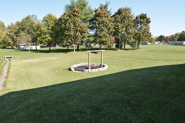 view of home's community with a lawn