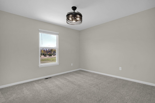 empty room featuring carpet