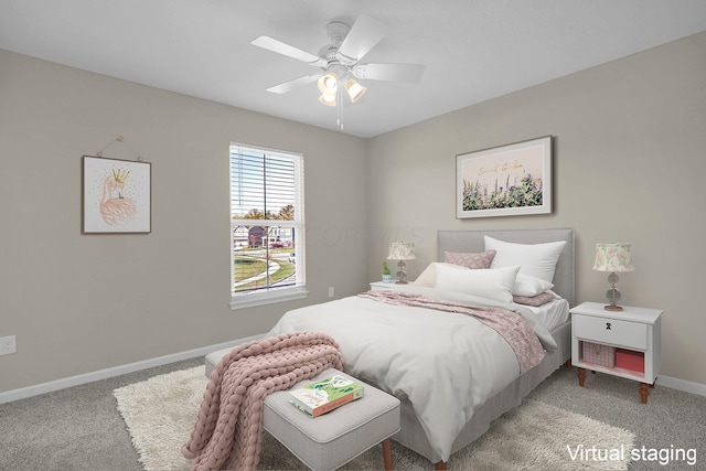 bedroom with ceiling fan and light colored carpet