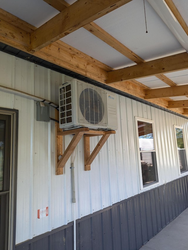 room details with ac unit and wooden walls