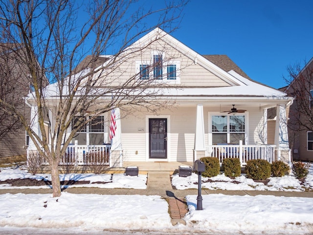 bungalow with ceiling fan and a porch