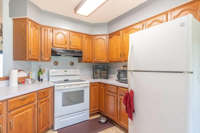 kitchen featuring white appliances