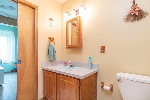 bathroom with vanity and toilet