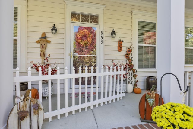 doorway to property with a porch