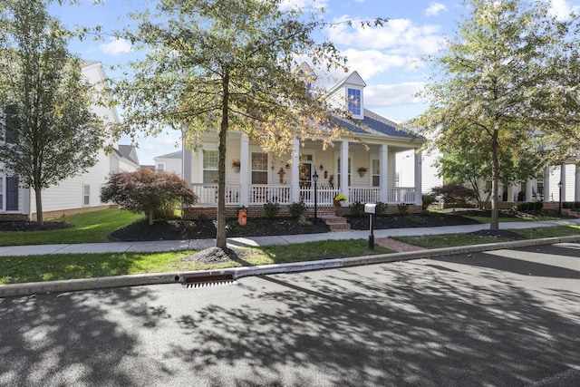 view of front facade featuring covered porch