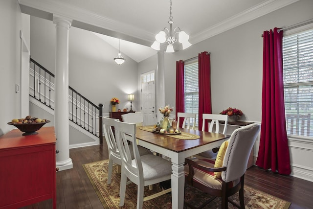 dining area with dark hardwood / wood-style flooring, a wealth of natural light, and ornamental molding