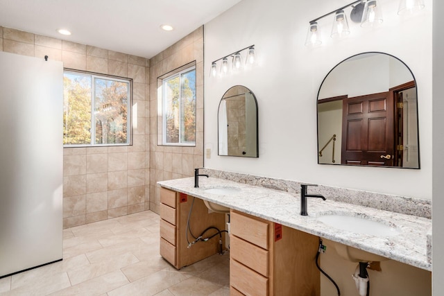 bathroom featuring tile patterned floors and vanity