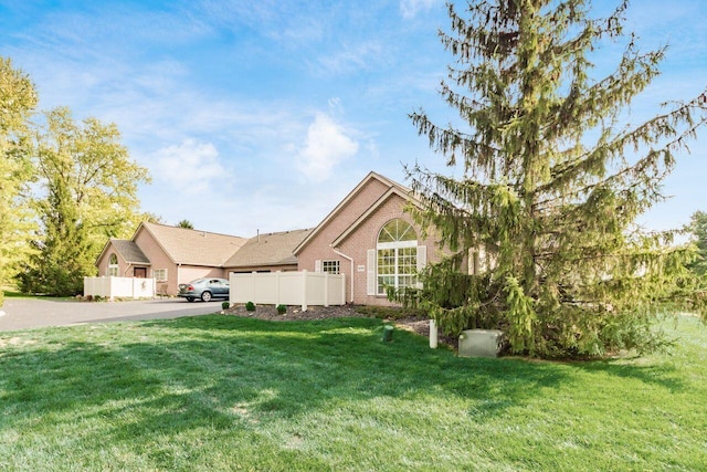 view of front of home with a front lawn