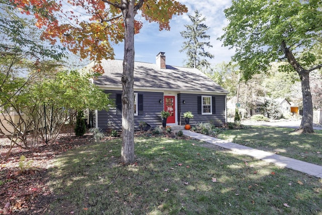 ranch-style home with a front lawn