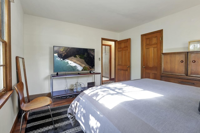 bedroom with wood-type flooring