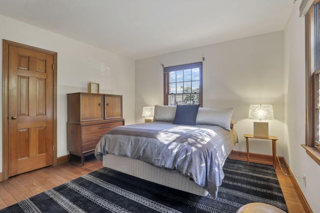 bedroom with wood-type flooring