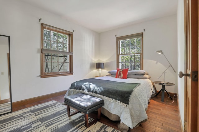 bedroom with hardwood / wood-style floors