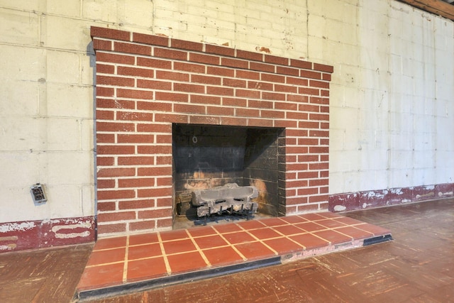 room details featuring a brick fireplace