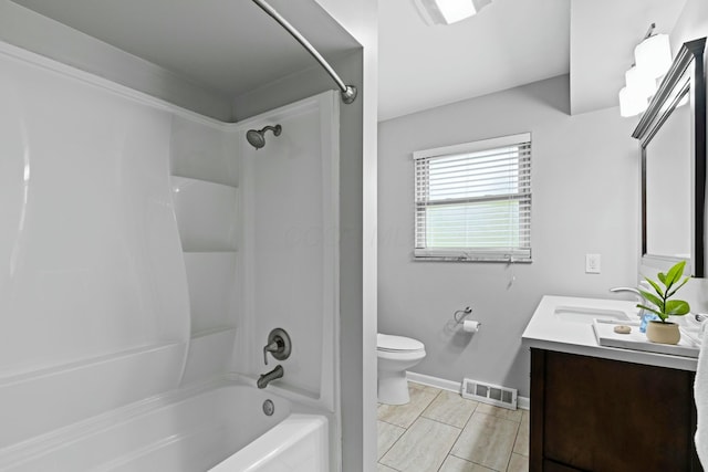 full bath featuring visible vents, toilet, a sink, washtub / shower combination, and double vanity