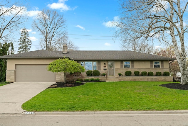ranch-style home featuring stucco siding, a front yard, stone siding, an attached garage, and concrete driveway