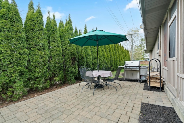 view of patio with outdoor dining area