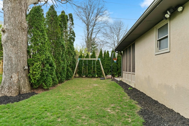 view of yard with a playground