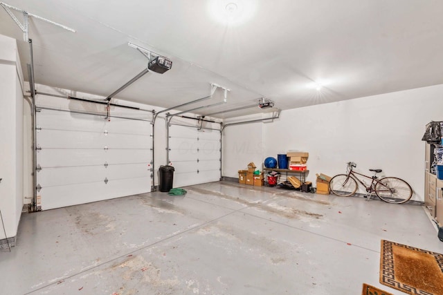 garage featuring a garage door opener