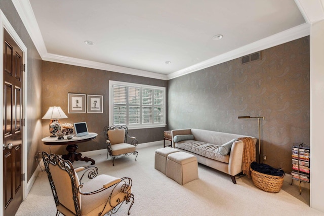 living area featuring crown molding and light colored carpet