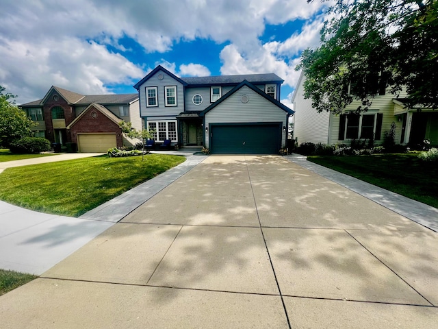 view of front of property with a front lawn and a garage