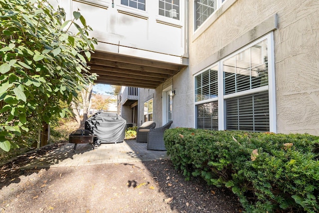 view of property exterior featuring a patio