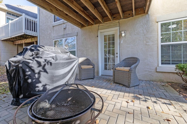 view of patio / terrace featuring a fire pit