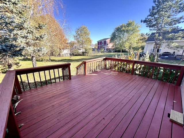 deck featuring a lawn