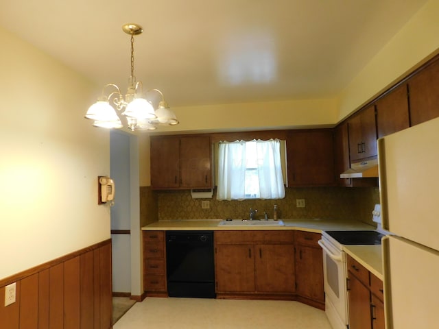 kitchen with sink, an inviting chandelier, decorative light fixtures, white appliances, and decorative backsplash