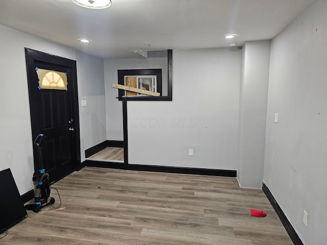 entrance foyer with hardwood / wood-style floors