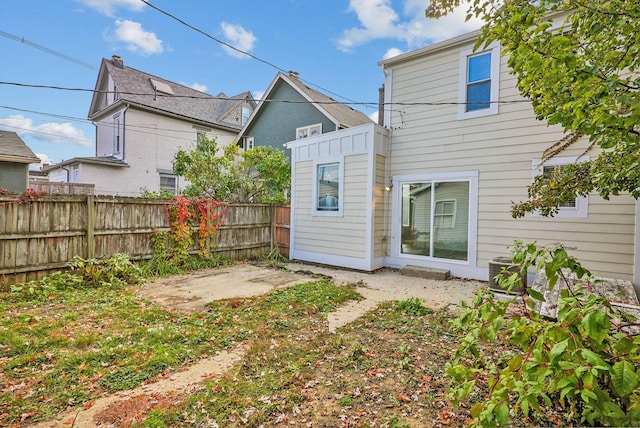 rear view of house with a patio