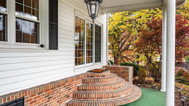 view of patio featuring a porch